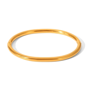 Detailed view of the gold minimalist stainless steel bangle with side hinge clasp mechanism