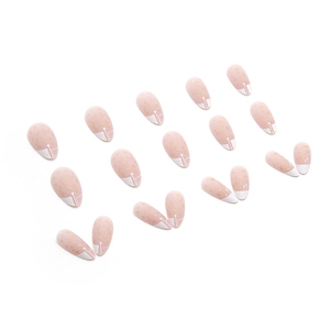 French white tip almond press-on nails with gold foil accents and soft pink gradient