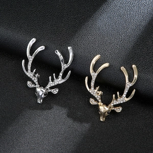 Elegant gold and silver reindeer lapel pins with sparkling rhinestones for men suits