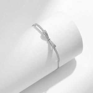 Elegant 925 sterling silver bow bracelet with sparkling pavé cubic zirconia