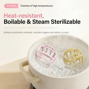 Food grade silicone baby teether maze ball showing heat resistance during boiling water cleaning