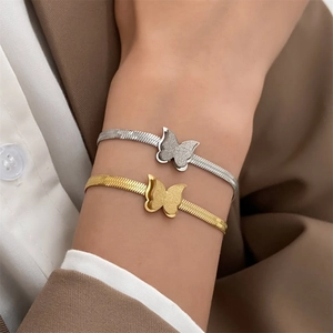 Elegant 18K gold butterfly layered snake chain bracelet in gold and silver finishes
