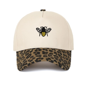 Detailed bee embroidery on beige cotton baseball cap with stylish leopard print brim