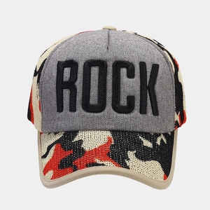 Close-up of ROCK embroidery and textured knit camouflage fabric on baseball cap