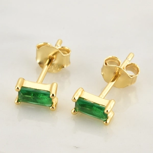Detailed close-up of S925 sterling silver earrings with rectangular emerald green stones