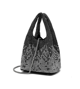 Detail of silver rhinestone bucket bag with gradient crystals and chain strap