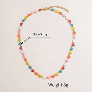 Detailed view of colorful heart enamel necklace with 35 plus 3cm length and 8g weight