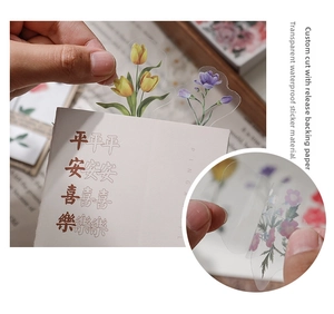 Detailed macro view of waterproof floral stickers with PET material and die-cut tulips