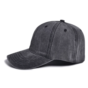 Close-up of charcoal gray washed cotton baseball cap with vintage texture and 6-panel stitching