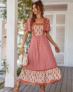 Detail of the boho floral pattern and tiered hem on this square neck maxi dress