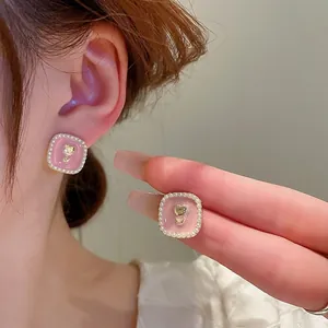 Exquisite handmade flower stud earrings with pink enamel, faux pearls and gold tulip
