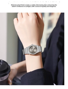 Detail of GEDI luxury silver steel watch featuring sunburst dial and rhinestone bezel