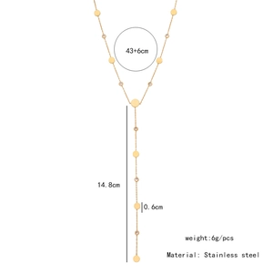 Detail view of gold titanium steel Y-necklace with size specs and 14.8cm tassel length