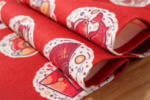 Detail shot of heavy polyester cotton table runner with red festive lunar new year patterns