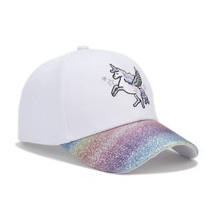 Detail of unicorn embroidery and rainbow sequin brim on kids white baseball cap