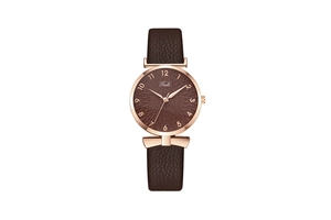 Detail view of Tadi fashion watch with brown leather strap and rose gold textured dial