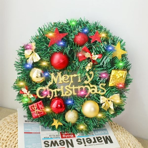 Couronne de Noël en PVC avec LED, nœuds rouges et boules dorées sur papier vintage