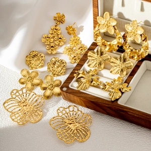 Elegant gold metal floral earrings collection with irregular texture and french style