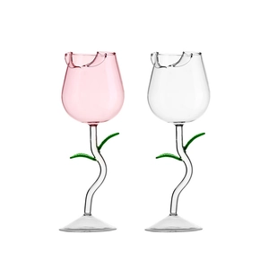 Elegant rose-shaped crystal wine glasses with green stem in pink and clear glass