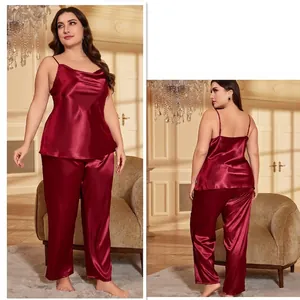Elegant burgundy silk satin pajama set featuring camisole top and matching long trousers