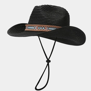 Detail of black woven straw cowboy hat featuring ethnic geometric pattern and adjustable cord