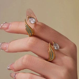 Minimalist open gold ring with water drop zircon and shimmering blue enamel inlay design
