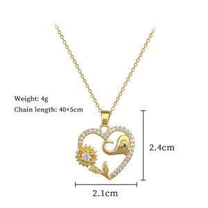 Detailed view of sunflower and elephant heart pendant with product dimensions and weight