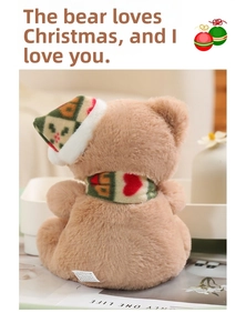 Vue arrière d'un ours en peluche marron avec bonnet de Noël et écharpe à cœurs
