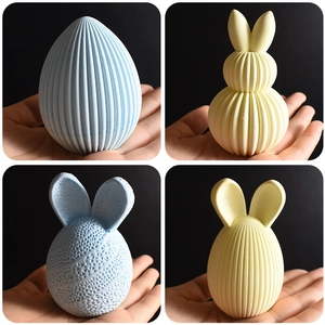 Pastel Easter bunny and egg silicone molds with intricate embossed texture for DIY crafts