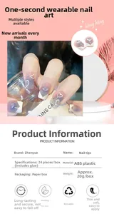 Detail of gradient lilac press-on nails with 3D transparent hearts and crystal accents