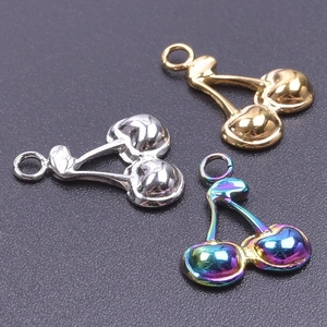 Three cherry-shaped stainless steel charms in gold, silver and rainbow plating detail