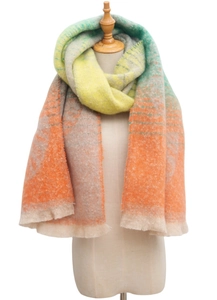 Detail of soft jacquard ginkgo leaf scarf with colorful gradient and tassel fringe