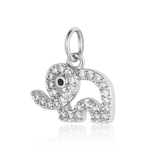 Macro shot of silver elephant charm pendant with sparkling pavé zircons and black gemstone eye