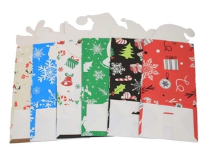 Christmas paper gift bags in five colors with festive snowflake and tree prints on white background