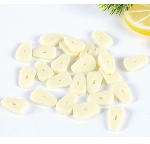 Macro detail of realistic PVC garlic slices for dollhouse DIY kitchen miniature scenes