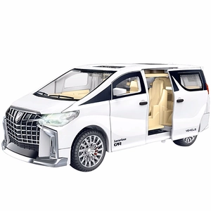 White MPV toy car model with open sliding doors and detailed beige interior seating