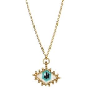 Macro detail of Bohemian evil eye pendant with colorful seed beads and gold chain
