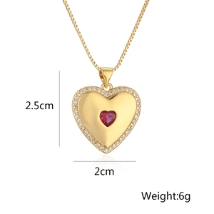Detail view of 18K gold plated heart pendant necklace with red gem and dimensions