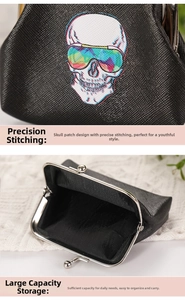 Macro shot of a black skull coin purse with metal kiss-lock and grid texture material