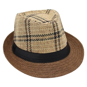 Detail of vintage straw fedora hat featuring woven plaid patterns and black ribbon band