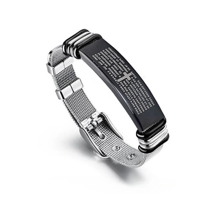 Detail of silver mesh bracelet with black plate engraved with Spanish Lord's Prayer