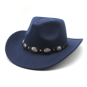 Detail of navy blue felt fedora with vintage silver metallic studs on leather band