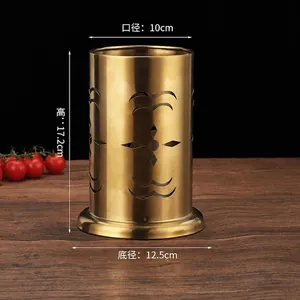 Detailed view of golden stainless steel hollow utensil holder with size dimensions