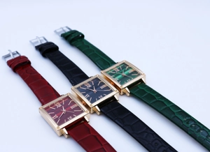 Three vintage square quartz watches with crocodile texture leather straps in multiple colors