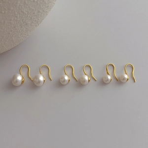 Three sizes of natural freshwater pearl earrings with golden hooks on stone decor