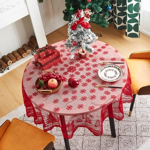Festive red lace tablecloth for round tables featuring elegant Christmas theme decor