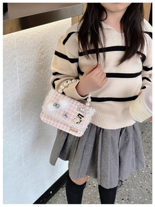 Pink tweed girls handbag featuring pearl handle lace trim and cute bow decorations