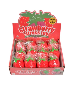 Detail of strawberry stress toys in a display box with soft safe and stretchy features