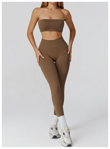Detail of brown seamless yoga set featuring a strapless tube top and high-waist leggings