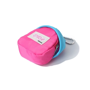 Detailed view of pink and blue mini backpack keychain with metal carabiner on white background